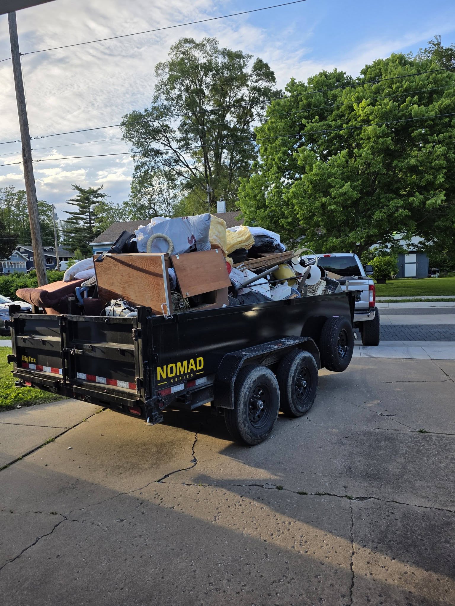 Full dump trailer loaded with junk